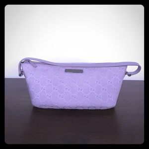Pre-loved authentic Gucci lavender canvas handbag